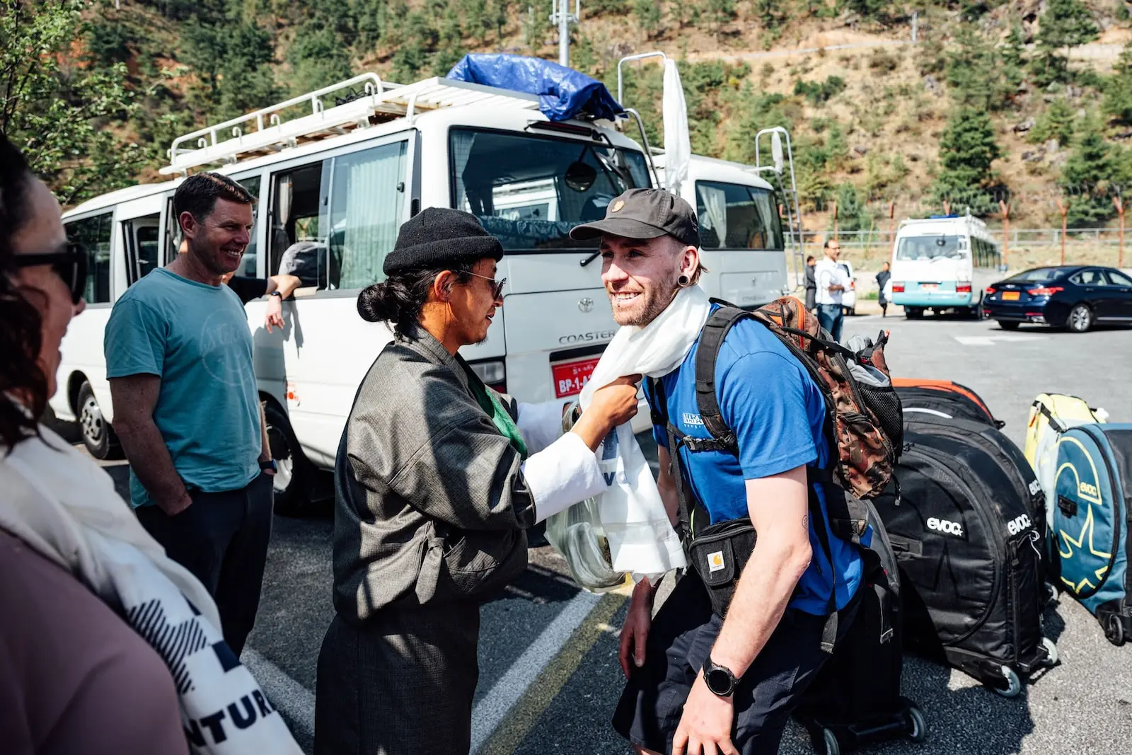 Receiving a blessing before mountain biking in Bhutan