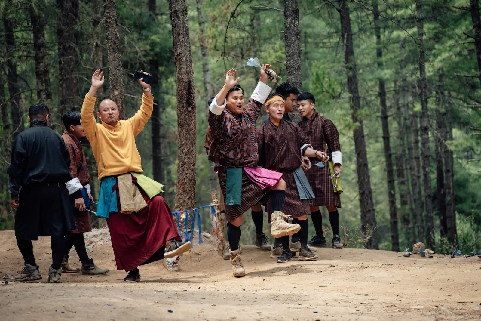 Locals in Bhutan celebrating their win at darts