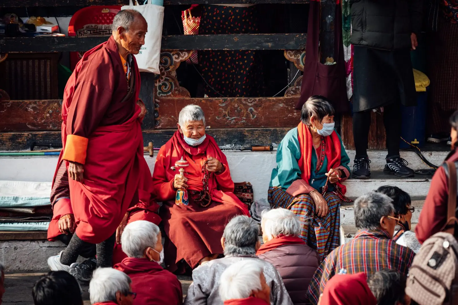 elderly ladies gathering for buddhist celebration