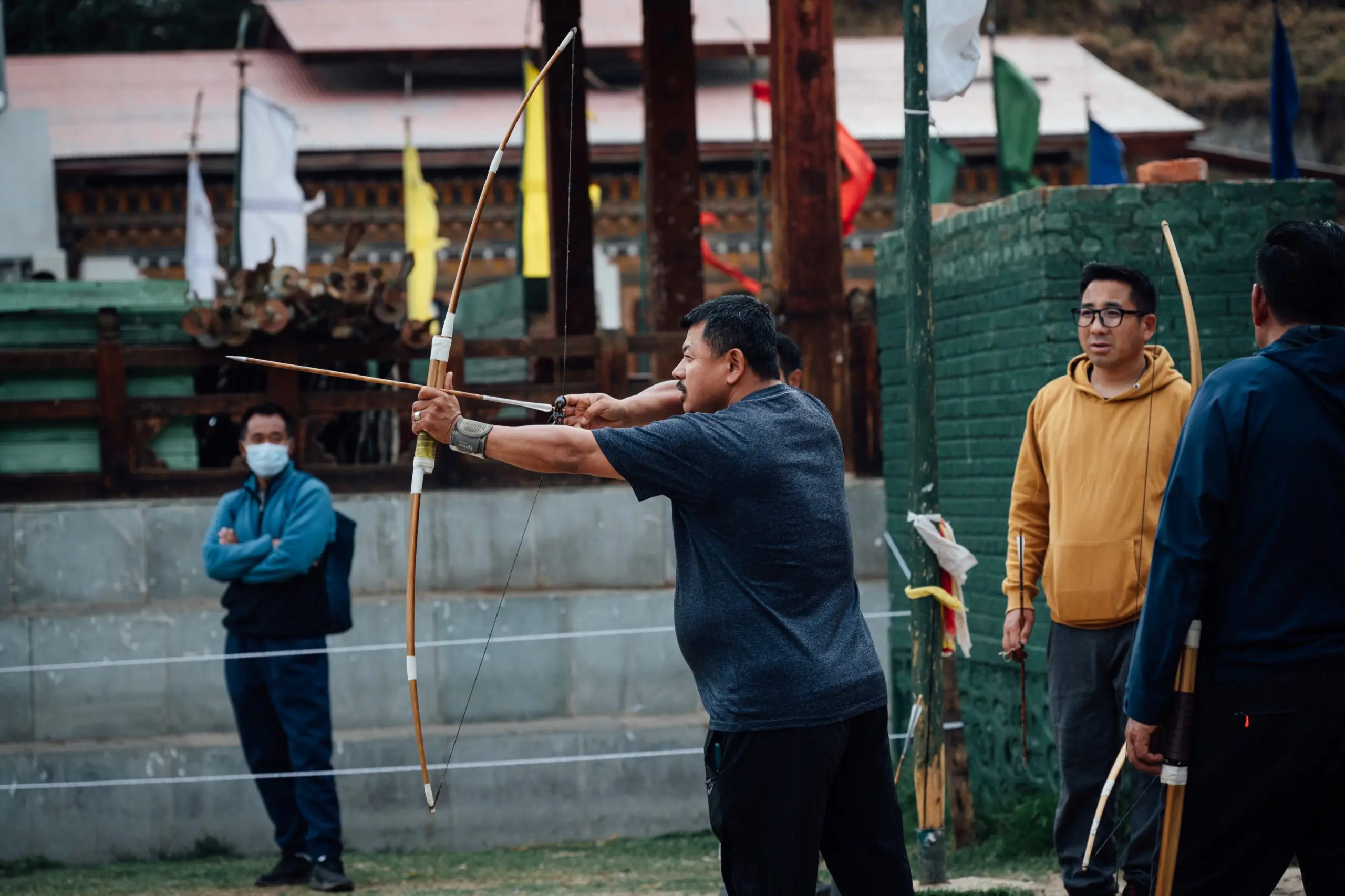 Local men playing Archery