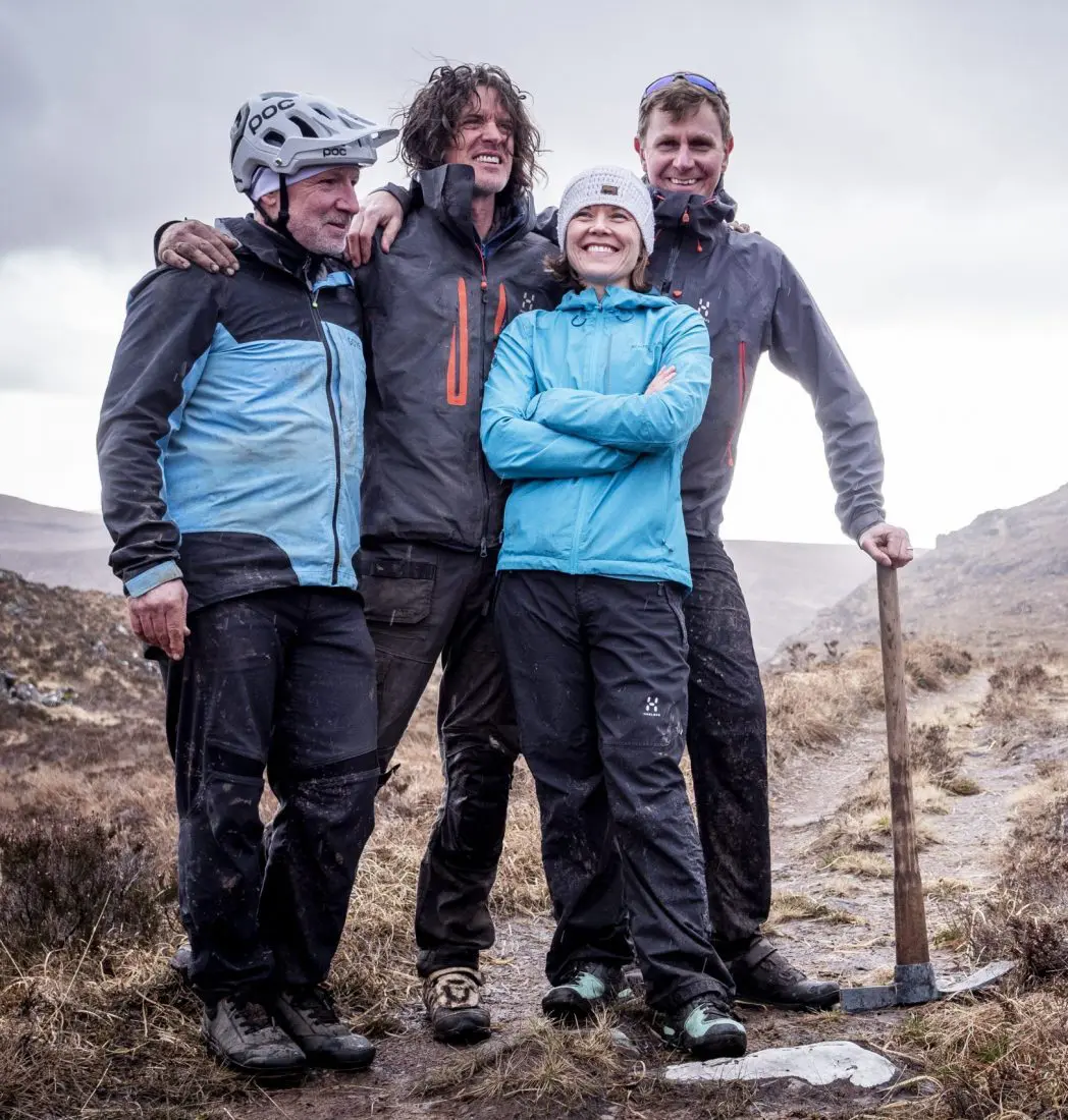 Four mountain bikers in the hills of Scotland